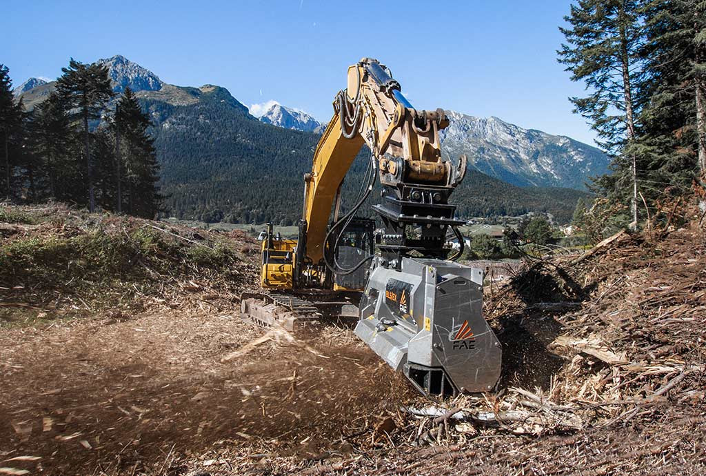 When special vehicles such as excavators, skid steers or tracked vehicles are used for road work,  the solution is a forestry mulcher, a stump cutter or a a stone crusher that uses the hydraulic system of the machines to move the rotor